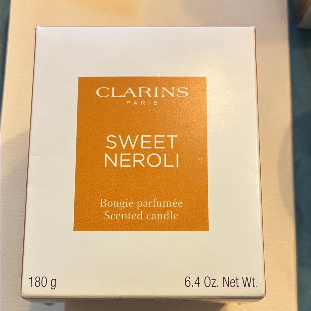 Clarins Paris Sweet Neroli Scented Candle in Orange & White Box New 6.4 Oz. - Picture 2 of 4